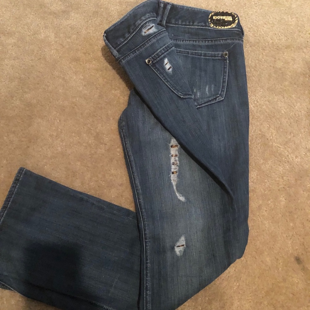 Distressed cheetah express jeans